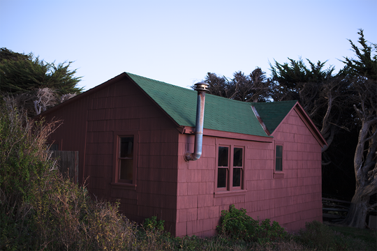 Red Seaside Cabin