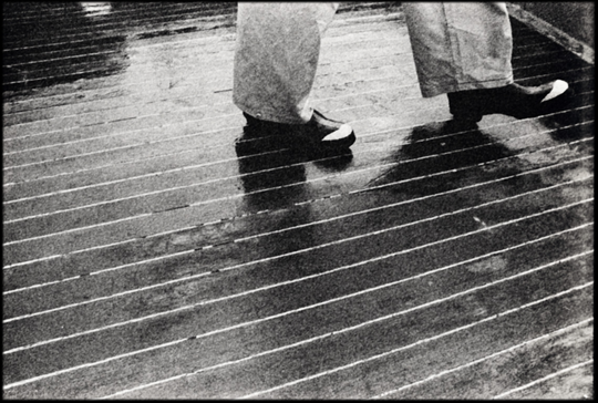Boots On The Wet Deck